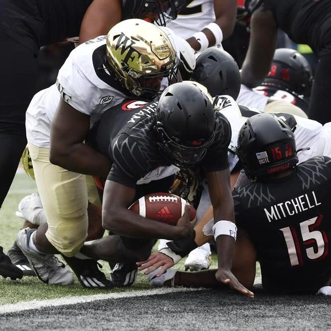 Louisville quarterback Malik Cunningham crosses the goal line.jpeg